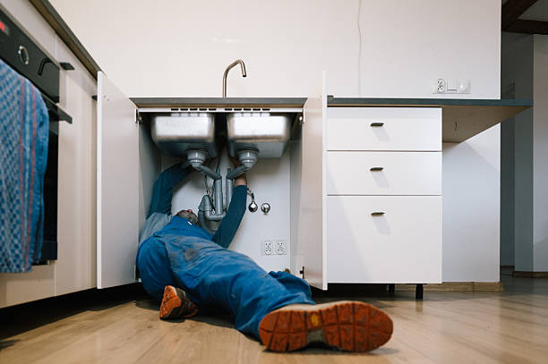 Professional Plumbing technician working in North Prairie, WI
